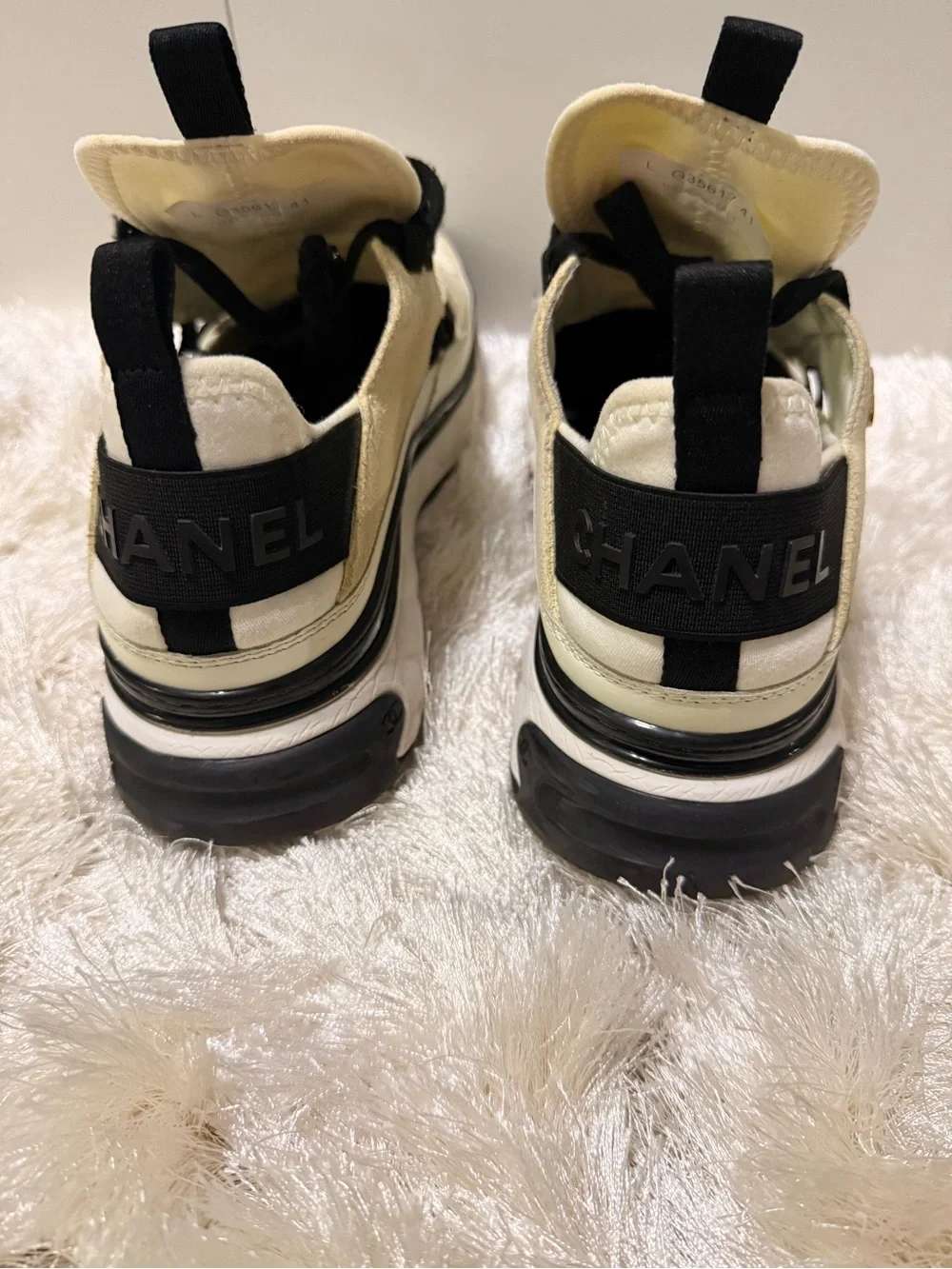 AUTHENTIC CHANEL Cream and Black Low-Top Sneakers with Gold Logo